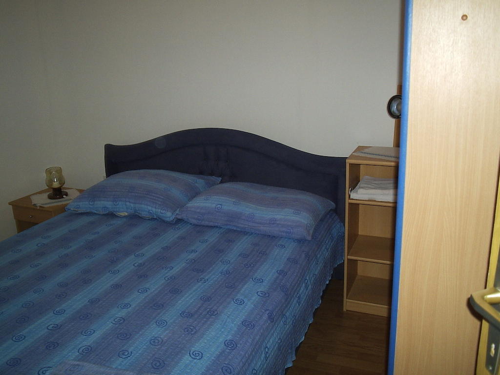 Apartments Holiday ลุมบาร์ดา ห้อง รูปภาพ